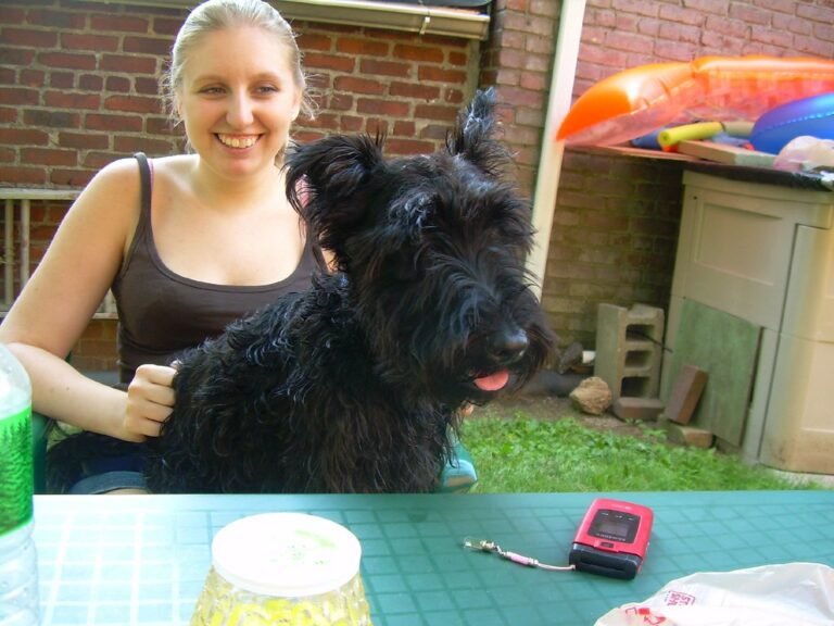 woman with black dog