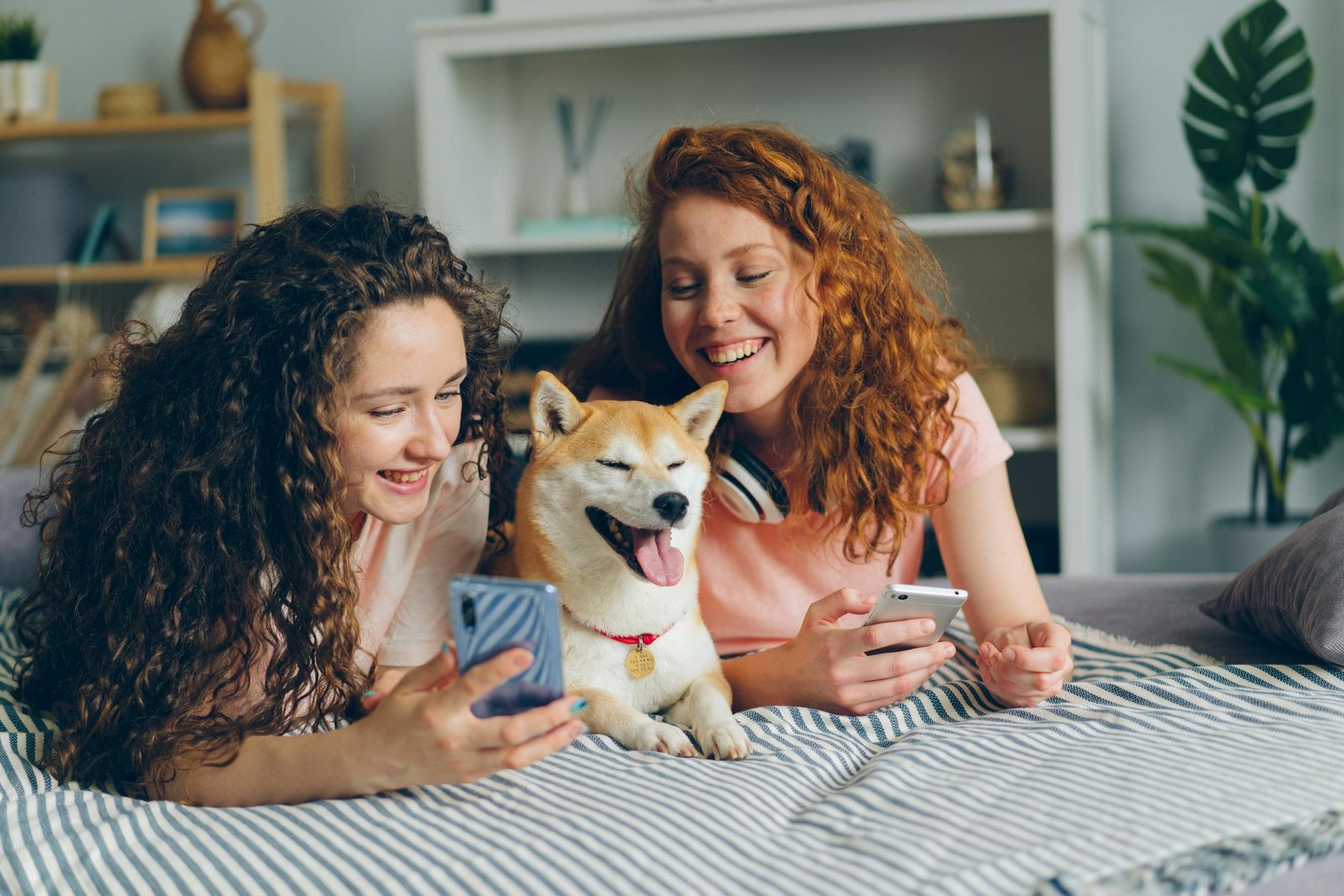 Two Women with a Dog